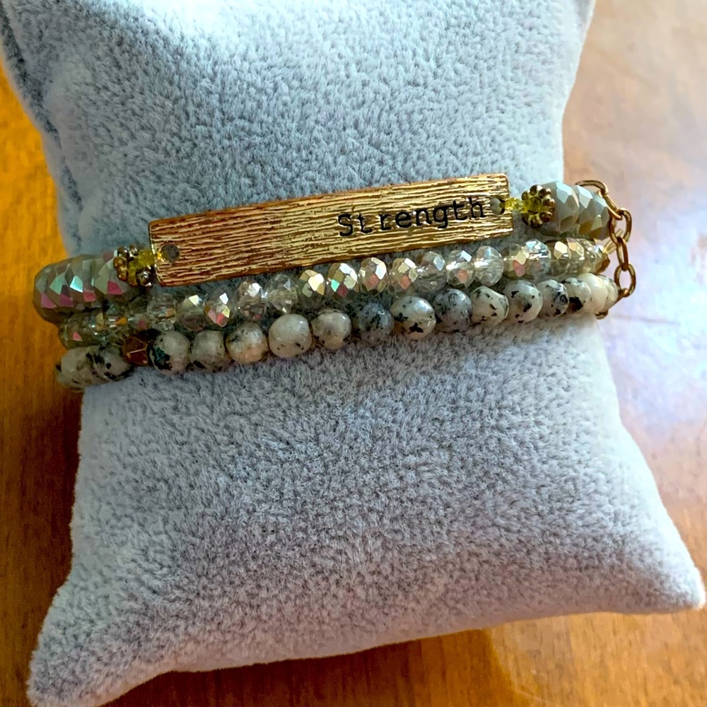 3 Stackable Bracelets with the word ‘Strength’
